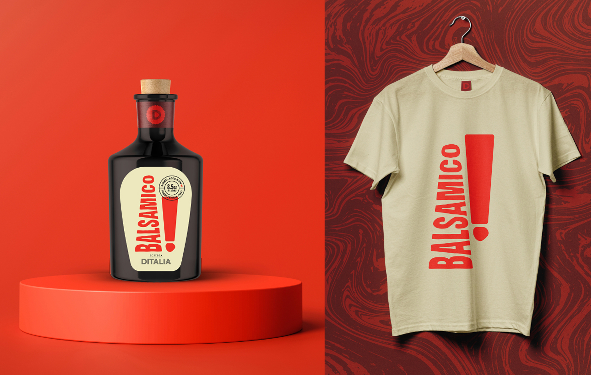 A bottle of balsamic vinegar with a bold BALSAMICO! label sits on a red platform; next to it, a beige T-shirt hangs on a hook, featuring the same BALSAMICO! design in large red letters.