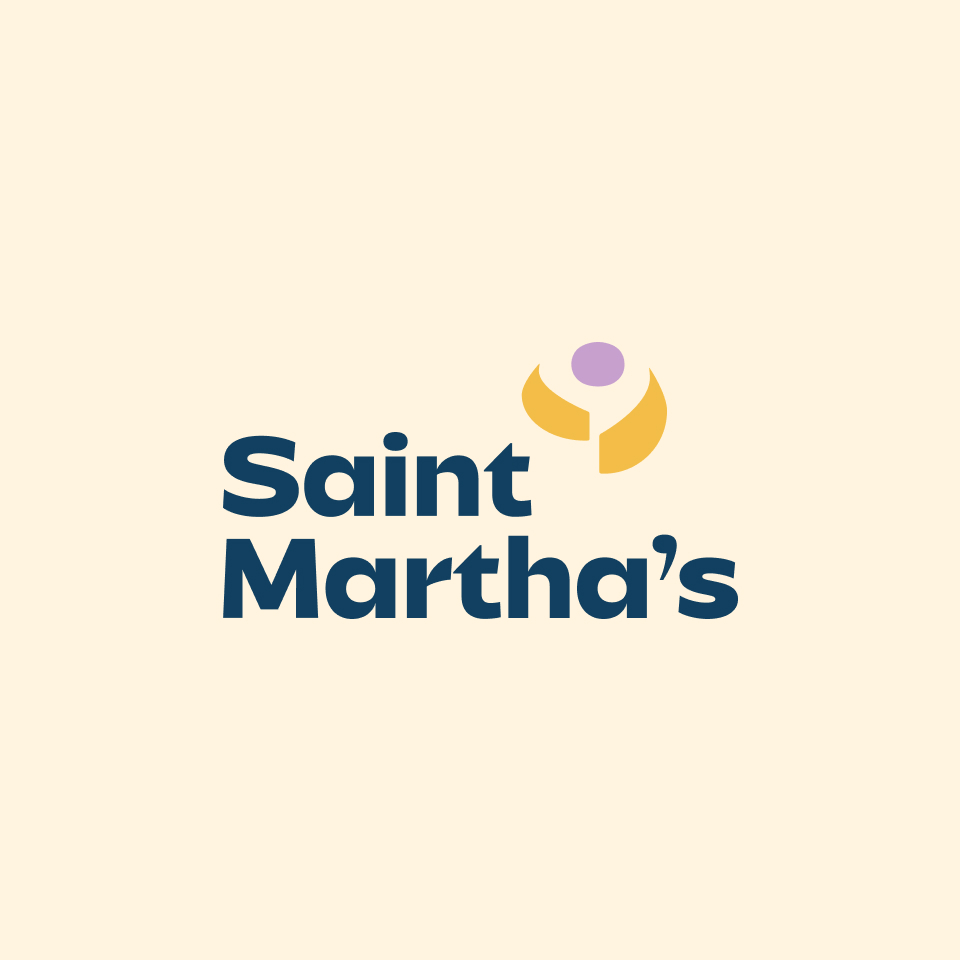 Saint Martha’s logo with bold blue text and a yellow and purple abstract symbol above the “h.” The background is a light cream color.
